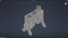 screenshot of a viewing window for Autodesk Inventor, shows a slightly larger engine model from an Orthographic birds-eye view, made of mostly a shiny dull grey material with some other metal parts accenting it