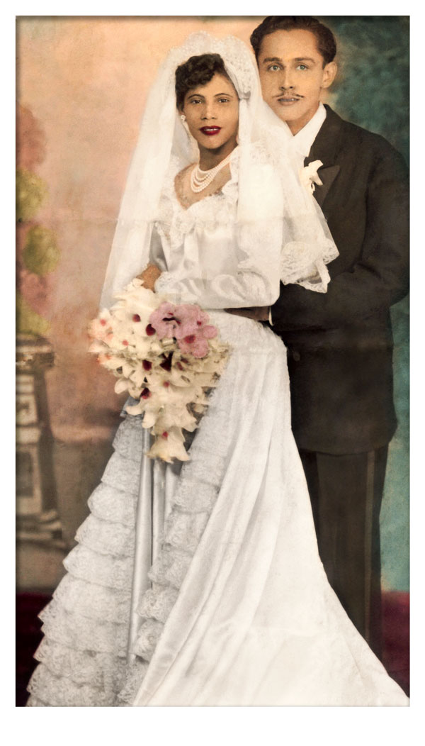 an old painted photograph of a bride and groom.